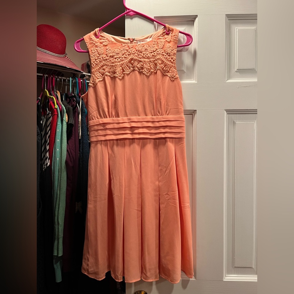 Small peach dress with lace embroidery on top